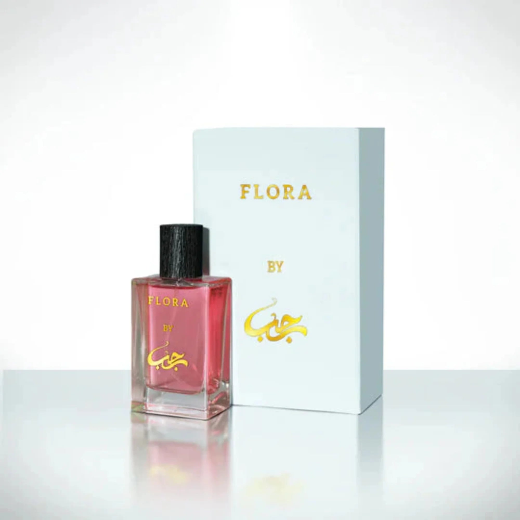 Perfume bottle and packaging with 'Flora' branding on a white background