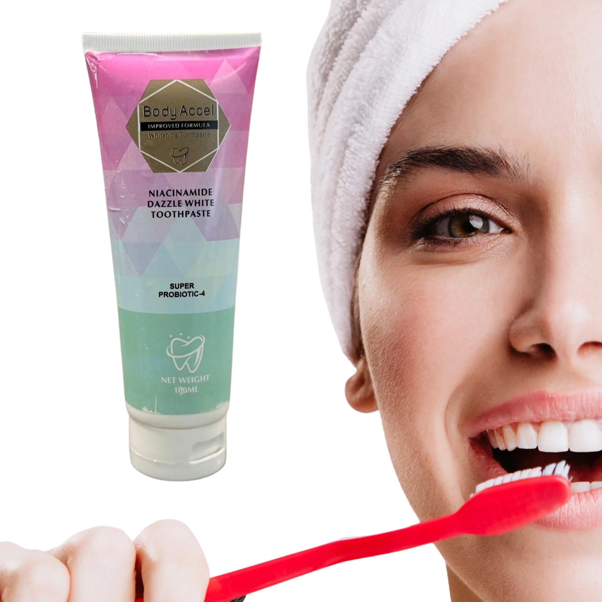 Woman brushing her teeth with a tube of Body Accel toothpaste on a white background