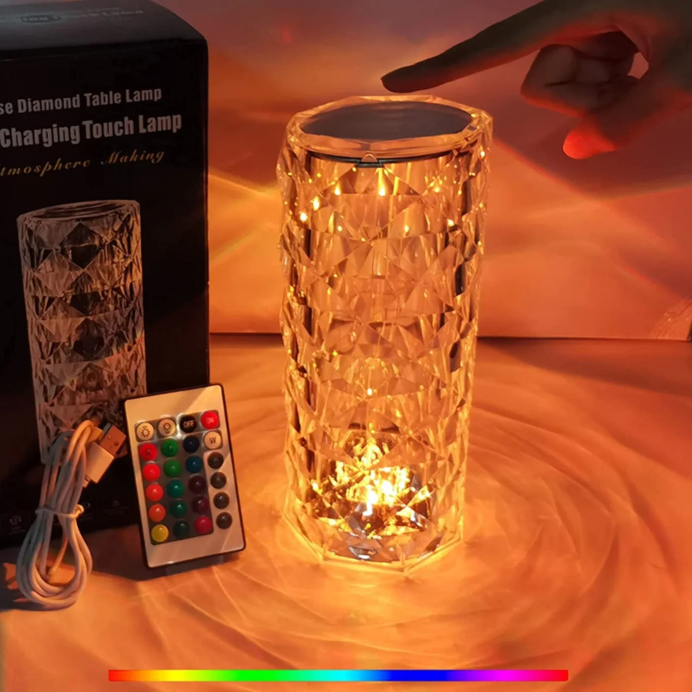 Glass table lamp with remote control on a wooden surface