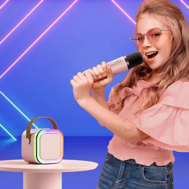 Woman singing into a microphone with a portable speaker on a blue background