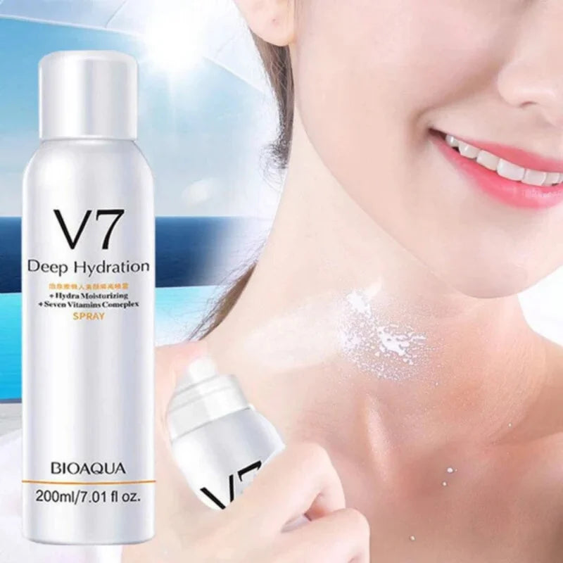 V7 Deep Hydration spray bottle with a person applying it to their face against a blurred beach background
