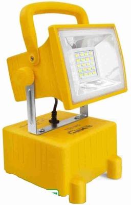Yellow portable flood light on a white background