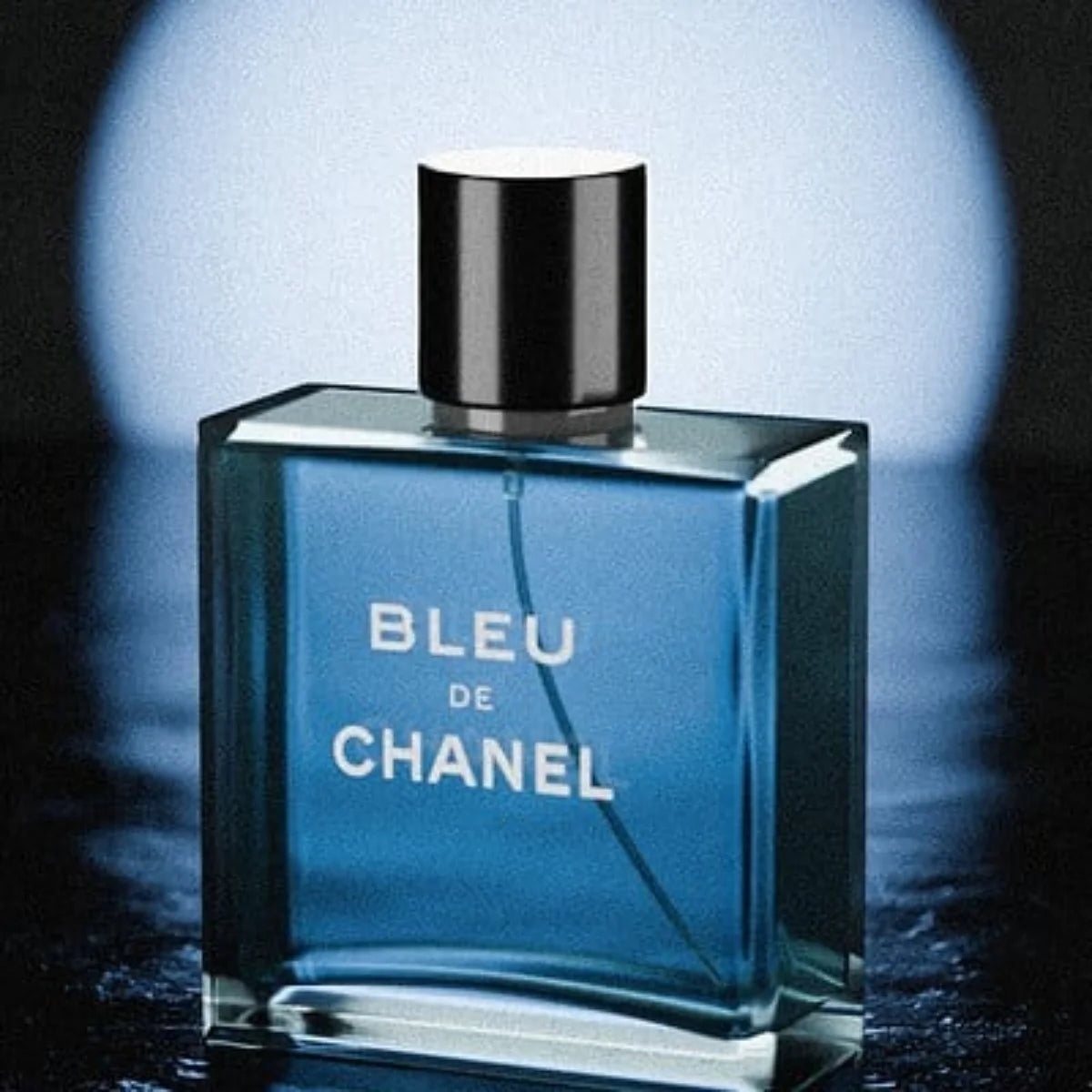 Bleu de Chanel perfume bottle on a dark background
