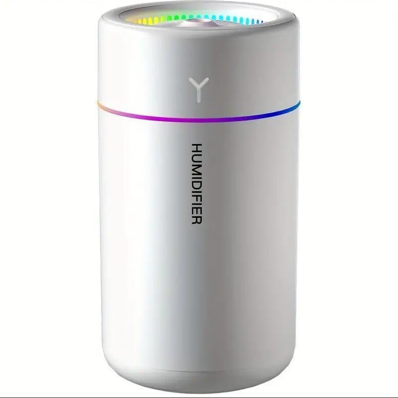 White humidifier with colorful LED lights on a white background