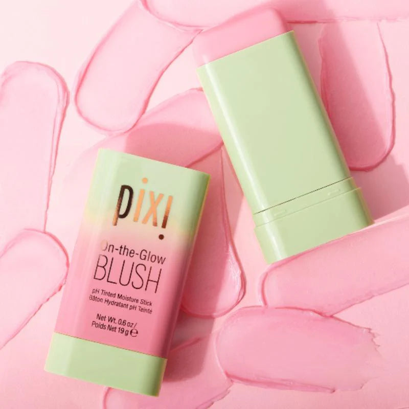  PIXI blush stick on a pink textured background